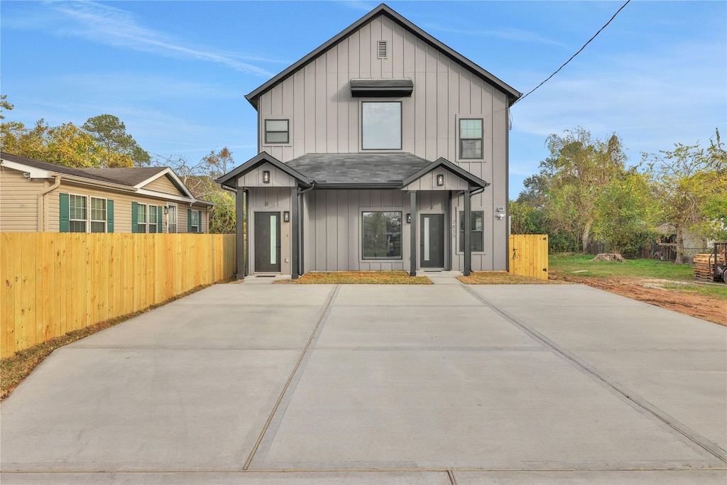 rear view of property featuring a patio area