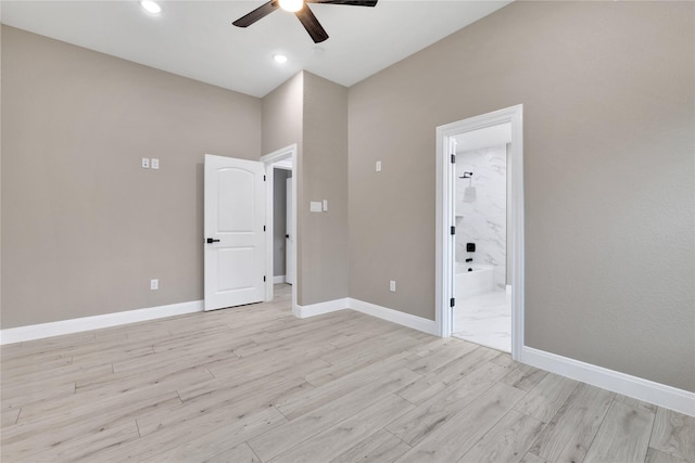 unfurnished room with ceiling fan and light hardwood / wood-style flooring