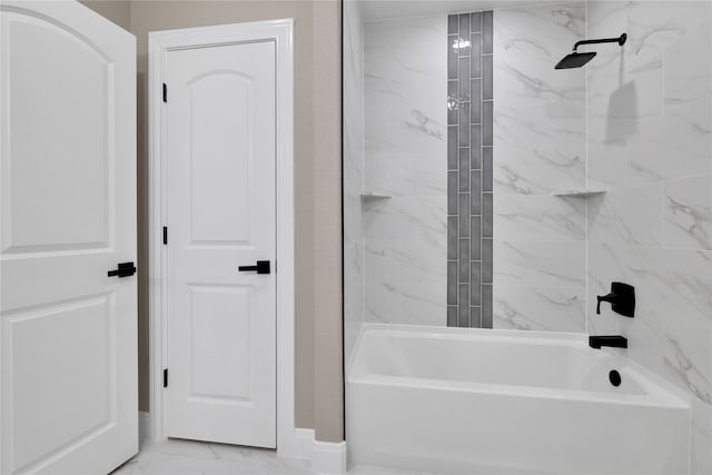 bathroom featuring tiled shower / bath combo