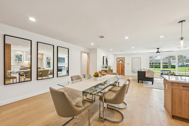 dining space featuring light hardwood / wood-style flooring