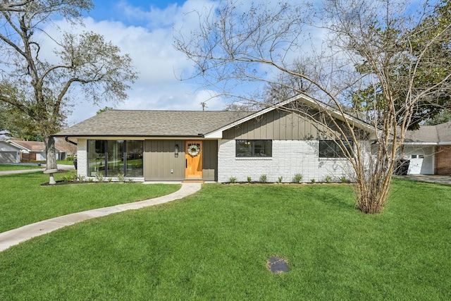 ranch-style home featuring a front yard