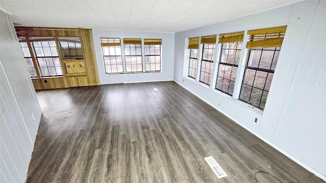 empty room featuring dark hardwood / wood-style floors