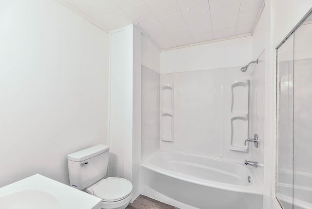 bathroom with shower / tub combination and toilet