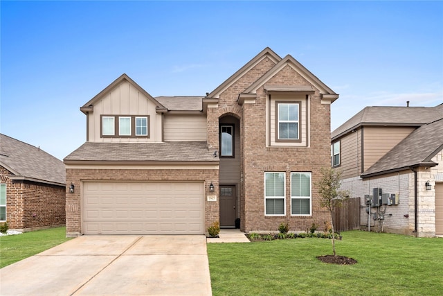 view of front of house with a garage and a front lawn