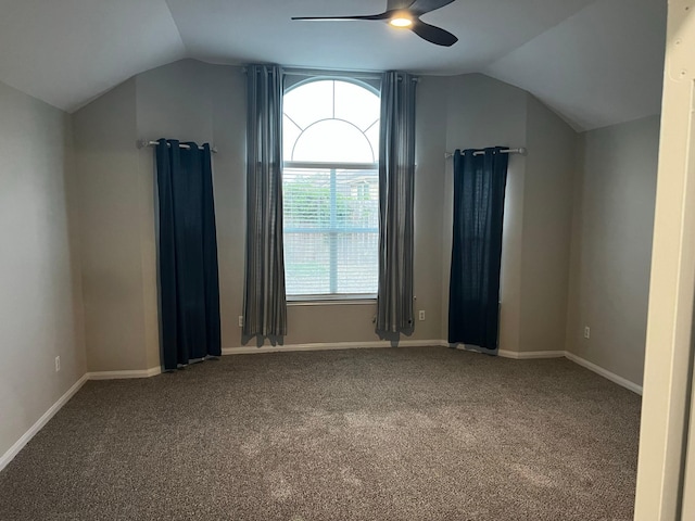 additional living space with ceiling fan, carpet floors, and vaulted ceiling