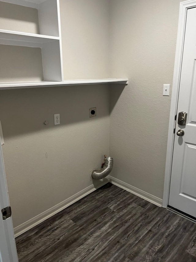 washroom featuring electric dryer hookup, hookup for a gas dryer, and dark wood-type flooring