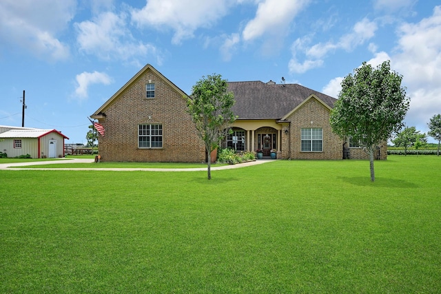 view of front facade with a front lawn