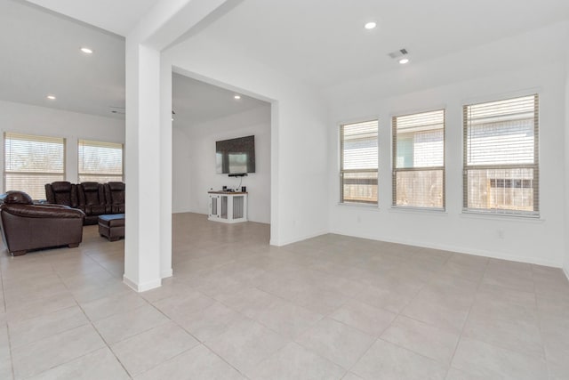 empty room with light tile patterned floors