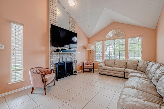 living room featuring a brick fireplace, light tile patterned floors, vaulted ceiling, and a textured ceiling