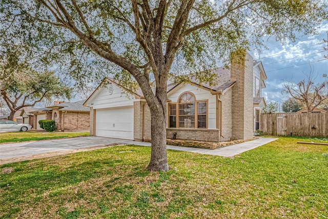 view of front facade with a garage and a front yard