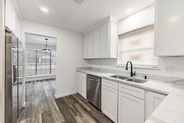 kitchen with white cabinetry, dark hardwood / wood-style flooring, dishwasher, and sink