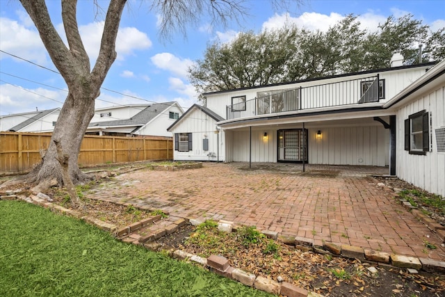 back of house with a patio area