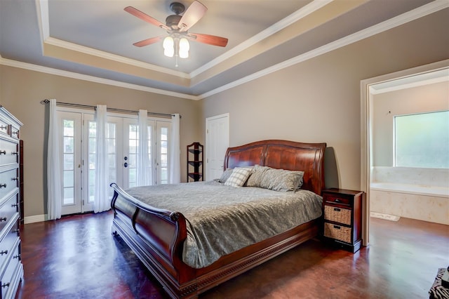 bedroom with a tray ceiling, crown molding, finished concrete flooring, and access to exterior