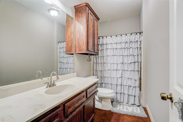 full bath featuring toilet, a shower with curtain, and vanity