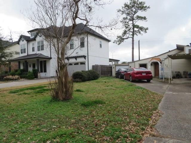 view of home's exterior with a yard