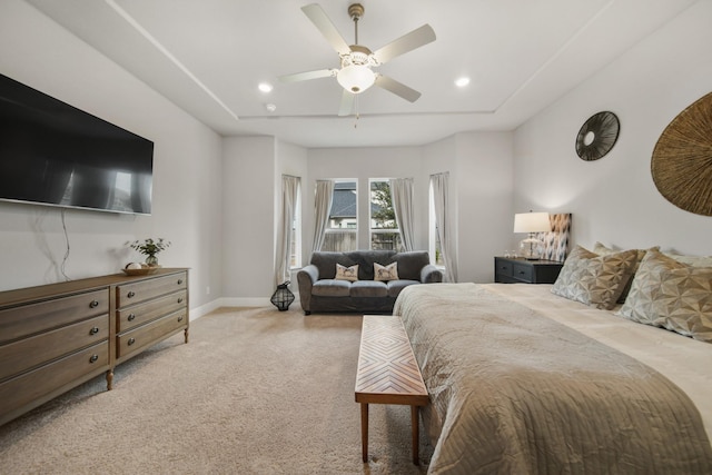 bedroom featuring light carpet, access to outside, and ceiling fan