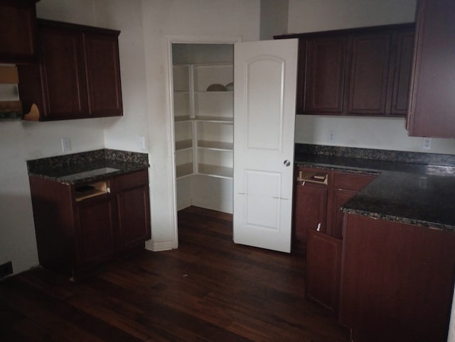 kitchen featuring dark hardwood / wood-style floors