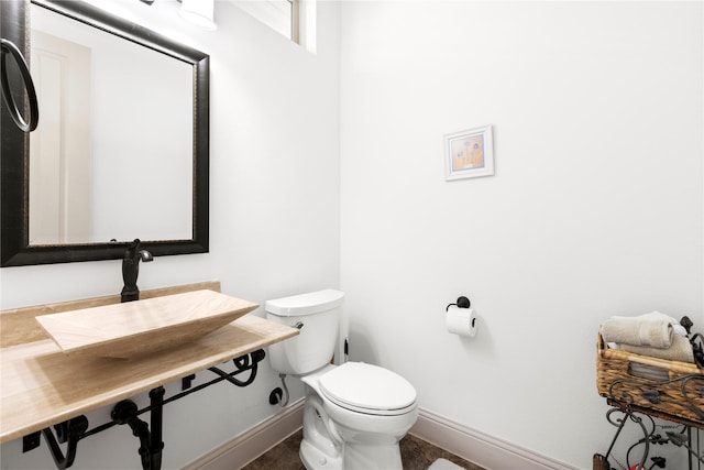 bathroom featuring toilet