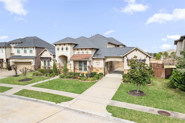 view of front of property with a garage and a front yard