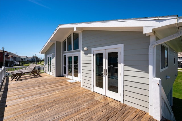 wooden terrace featuring french doors