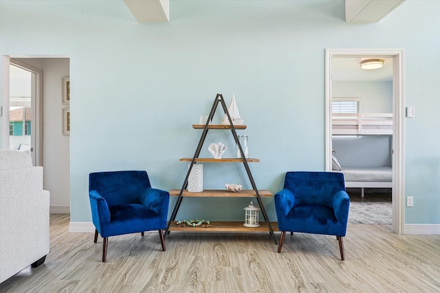 living area featuring light hardwood / wood-style floors