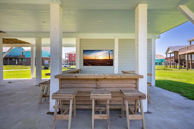 view of patio with a bar