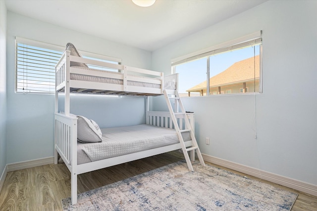 bedroom featuring wood-type flooring