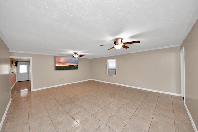 empty room with cooling unit, ornamental molding, a textured ceiling, and light tile patterned flooring