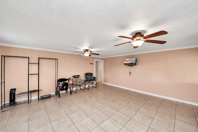 interior space featuring light tile patterned floors, crown molding, a textured ceiling, and ceiling fan