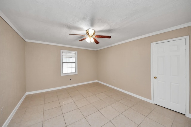 tiled spare room with crown molding, ceiling fan, and a textured ceiling