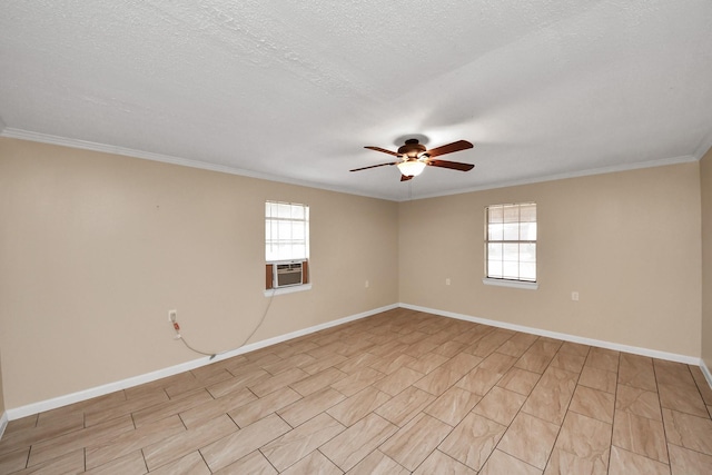 unfurnished room with a healthy amount of sunlight, cooling unit, a textured ceiling, and ceiling fan