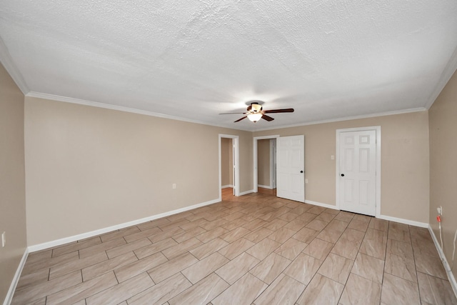 spare room featuring ceiling fan, ornamental molding, and a textured ceiling