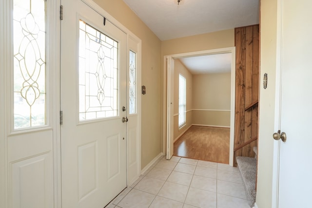 view of tiled foyer entrance