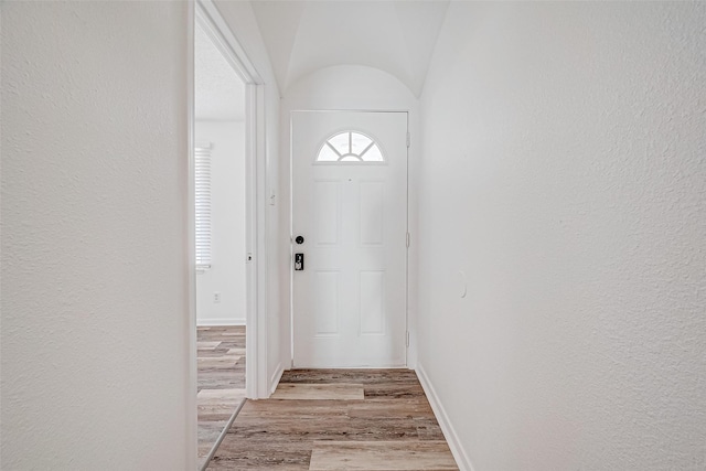 doorway to outside with light hardwood / wood-style floors