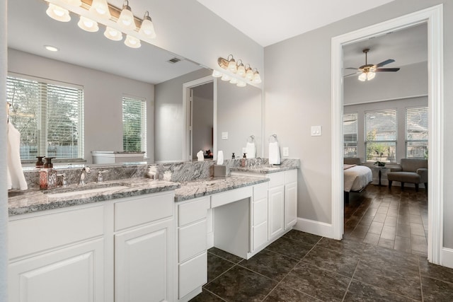 bathroom with ceiling fan, vanity, and toilet