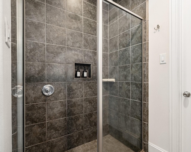 bathroom with an enclosed shower