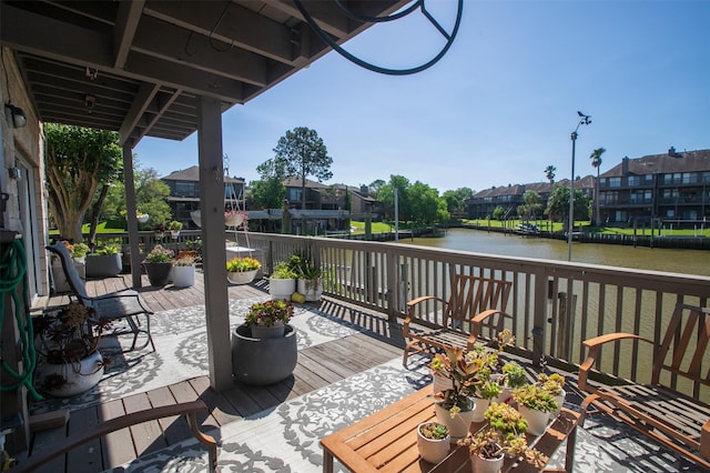 deck featuring a water view