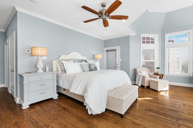 bedroom with dark hardwood / wood-style flooring, crown molding, and ceiling fan