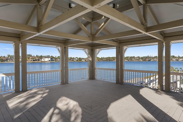 view of dock featuring a deck with water view