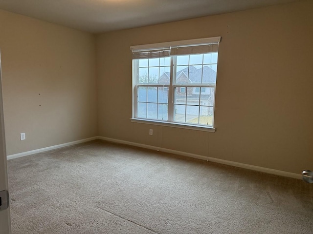 view of carpeted spare room