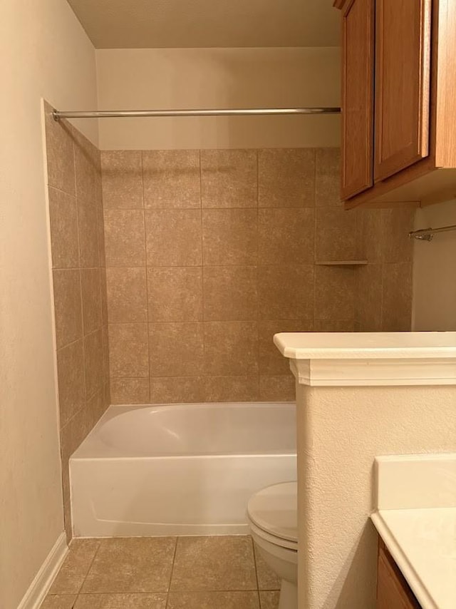 bathroom with toilet, shower / bath combination, tile patterned flooring, and vanity