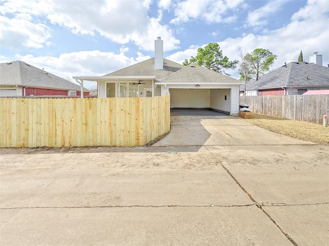 view of front of property with a garage