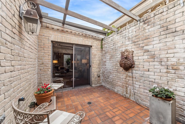 doorway to property with a patio area