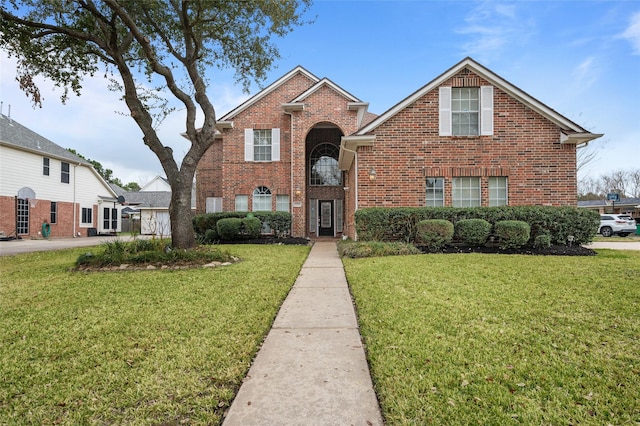 view of property with a front lawn