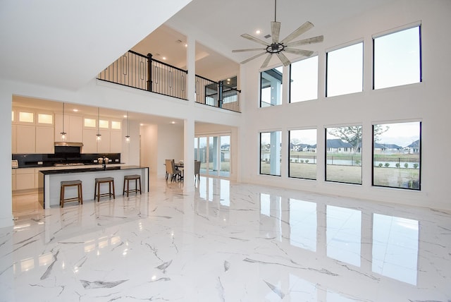 living room with ceiling fan