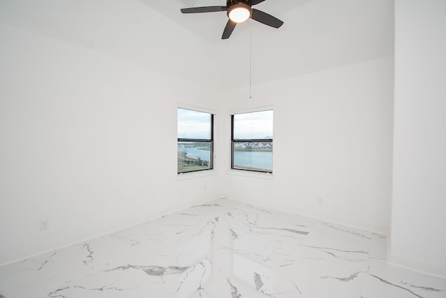 unfurnished room featuring ceiling fan