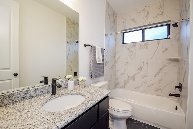 full bathroom with vanity, toilet, and tiled shower / bath combo