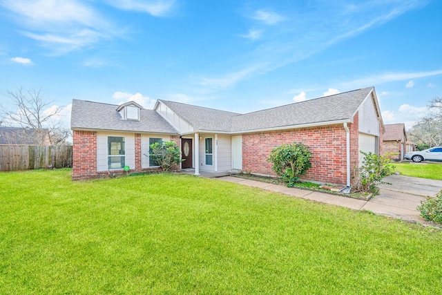 single story home featuring a garage and a front yard