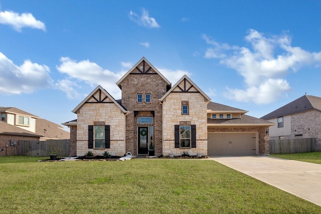 view of front of property featuring a garage and a front yard