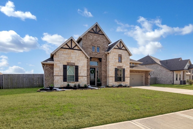 view of front of house with a garage and a front yard